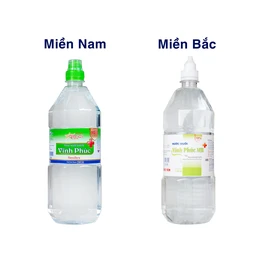Nước muối Vĩnh Phúc Smiles 1100ml natri clorid 0.9 giúp làm sạch răng, khử mùi hôi miệng
