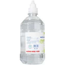 Nước muối Vĩnh Phúc Smiles 600ml natri clorid 0.9 giúp làm sạch răng, khử mùi hôi miệng