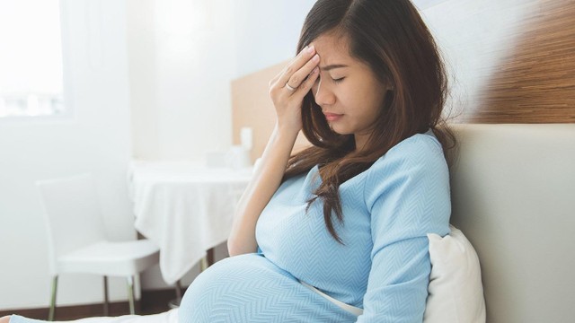 bai-viet/ba-bau-co-duoc-uong-thuoc-dau-dau-khong-cach-xu-tri-con-dau-dau-hieu-qua-an-toan.html