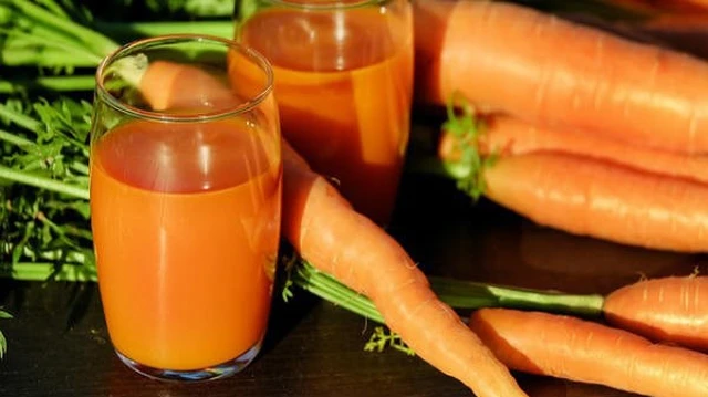 bai-viet/ba-bau-uong-nuoc-ep-ca-rot-duoc-khong-loi-ich-cua-nuoc-ep-ca-rot-voi-ba-bau.html