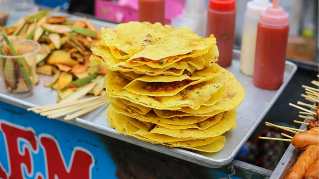 bai-viet/me-bau-an-banh-trang-nuong-duoc-khong-can-luu-y-gi-khi-an-banh-trang.html