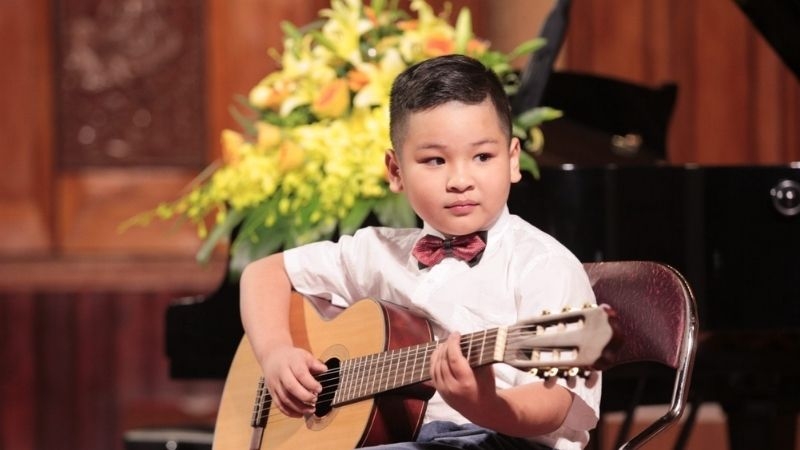 Học chơi guitar từ nhỏ giúp trẻ cảm thụ âm nhạc tốt hơn