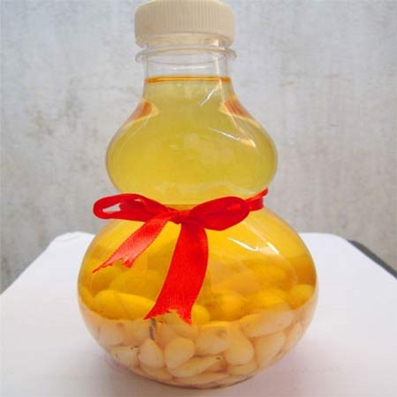 Bài thuốc dùng rượu tỏi trị trào ngược dạ dày 1