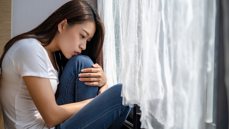 Buồn bã kéo dài là một trong số biểu hiện bệnh trầm cảm mức độ nhẹ