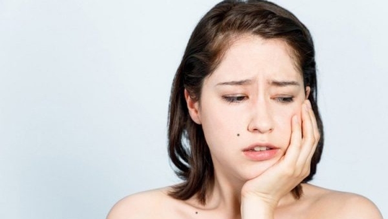 Cách giảm đau khi mọc răng khôn bị sưng má 1