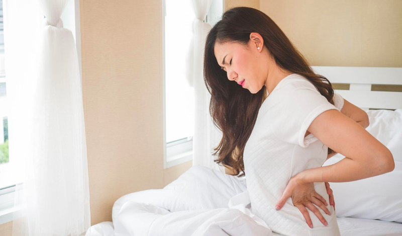 Dấu hiệu nhận biết có thai qua cơ thể: đau lưng