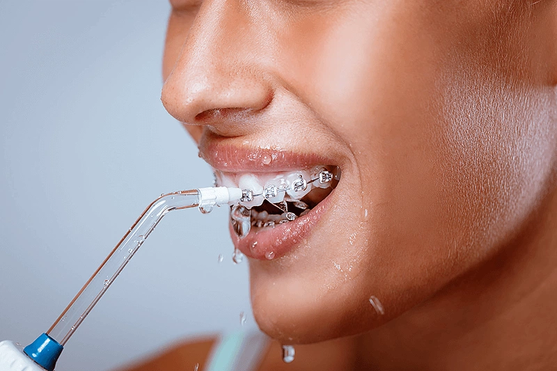 Dùng máy tăm nước có cần đánh răng không? 3