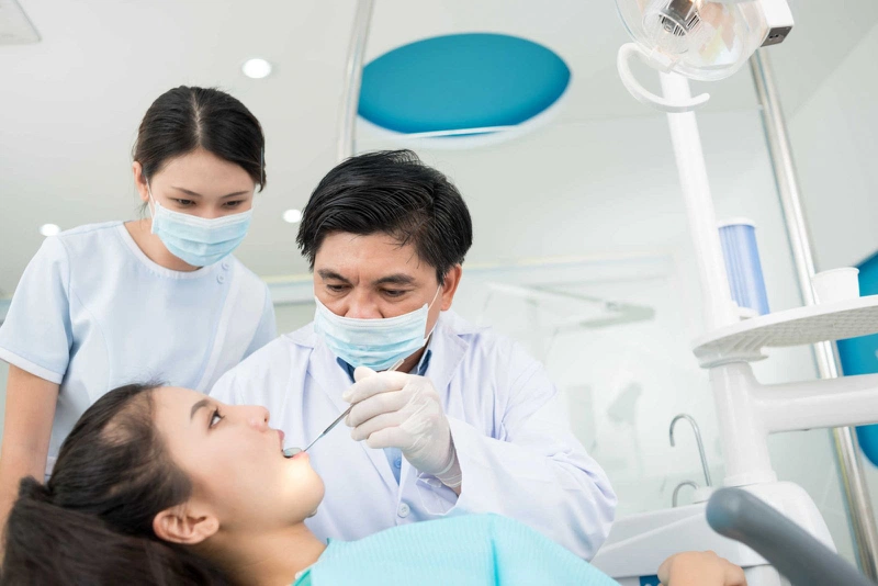 Nhổ răng khôn 2 tuần vẫn đau có làm sao không? 2