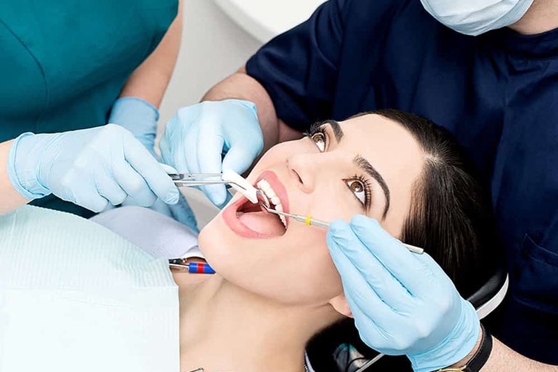 Lưu ý súc miệng nước muối sau khi nhổ răng khôn