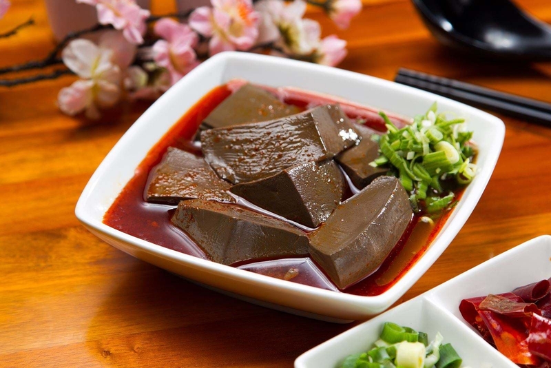 xăm môi có ăn được tiết luộc không 1