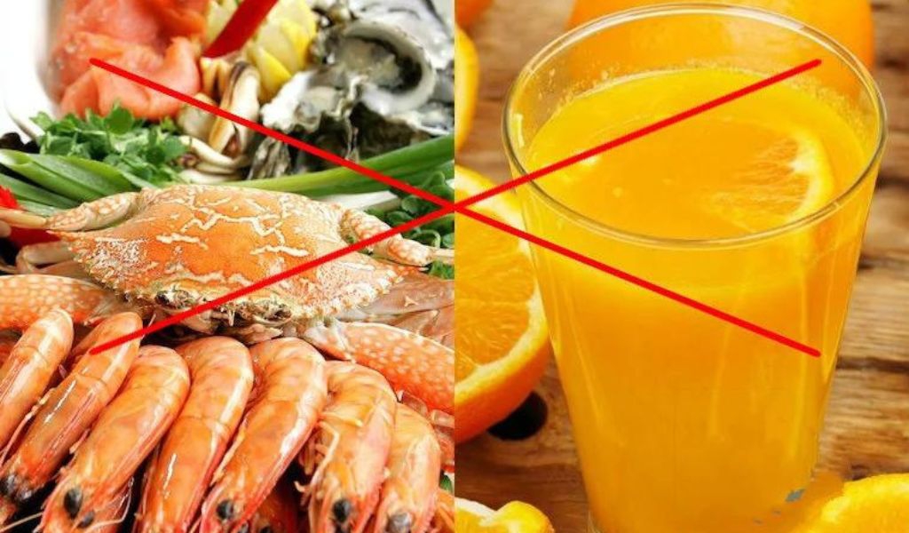  Ăn hải sản uống nước cam có được không?