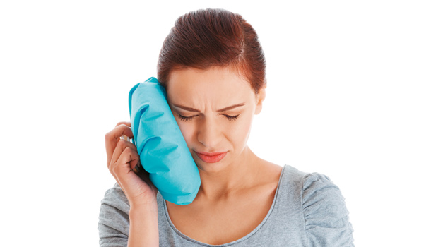 Nhổ răng khôn xong bị đau răng bên cạnh 04